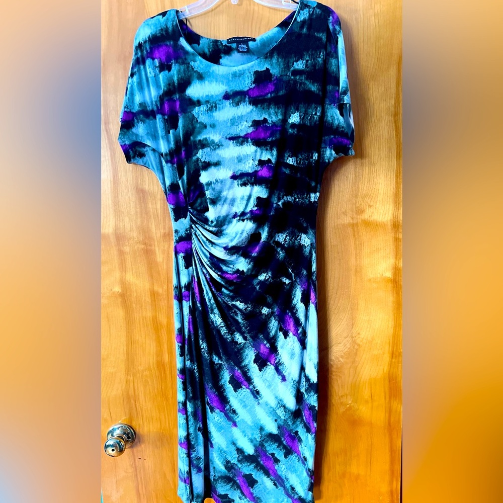 Show stopped cinch waist front and back. midi dress